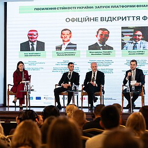 Six people at a panel 