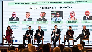 Six people at a panel 