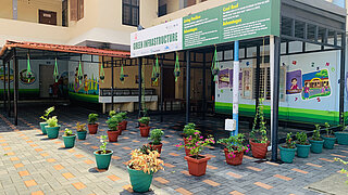 Picture of a living pavilion with plant pots Project NIUA