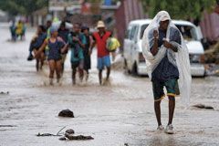 People making their way through a flooded street