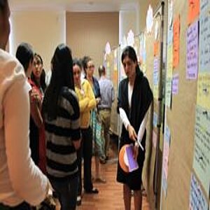 Workshop participants collecting ideas on a board