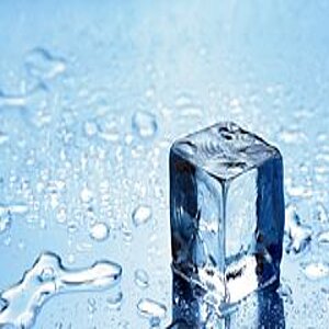 An ice cube on a wet blue surface